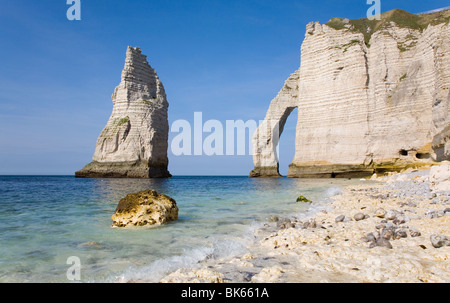 The famous cliffs at Etretat from the rocky beach Stock Photo