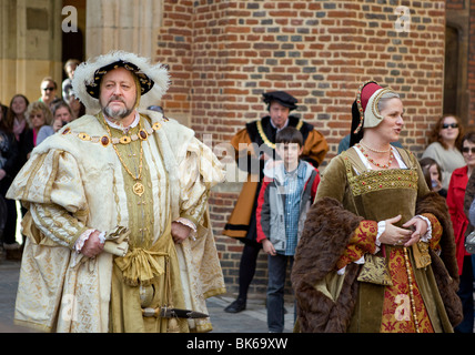 Actors play Henry V111 and his wife at Hampton Court Palace, Surrey, England. Stock Photo