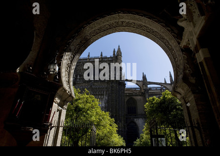 Part of Seville's Cathedral is seen across the Puerta del Perdon, or Forgiveness Door, Spain Stock Photo