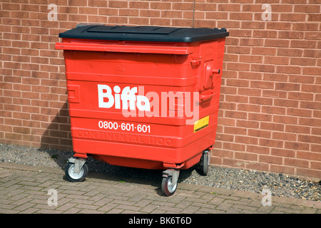 Red Biffa waste wheelie bin Stock Photo