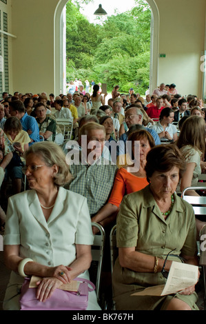 French Audience, Large Crowd People, From Front, at Classical Music Concert in urban 'Bagatelle Park' Paris, France, elderly people, seniors grown up Stock Photo