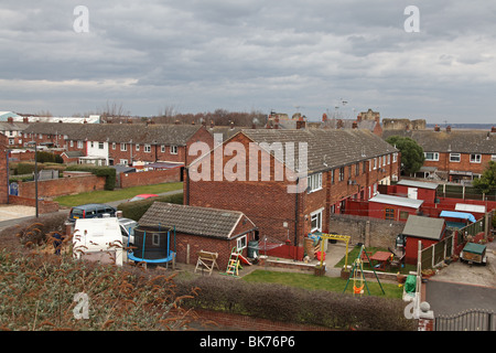 Castle Ward housing estate in Flint, Flintshire, North Wales in the shadow of Flint Castle Stock Photo