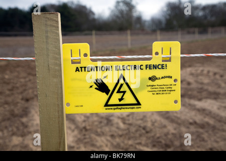 Attention Electric Fence warning sign Stock Photo