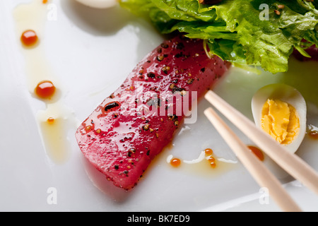 Raw fish tuna with salad Stock Photo