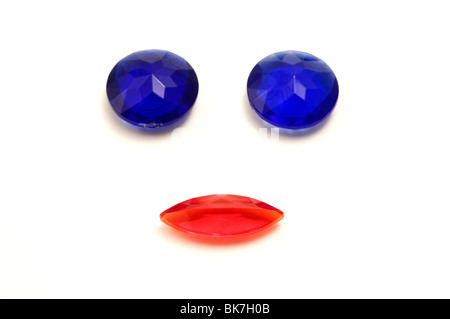 Plastic gemstones on a white background Stock Photo