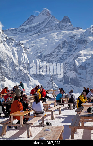 Relaxing outside a mountain restaurant, Grindelwald, Jungfrau region, Bernese Oberland, Swiss Alps, Switzerland Stock Photo