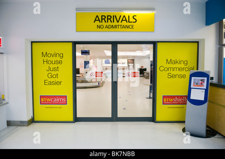 Exit of arrivals lounge at an airport Stock Photo