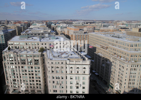 Washington DC,Penn Quarter,rooftops,office buildings,city skyline,view from Old Post Office Pavilion,winter,snow,flag,DC100218090 Stock Photo