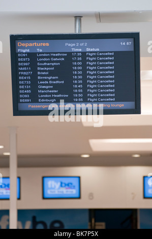 Departures board showing flights canceled Stock Photo