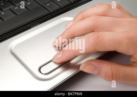 hand on computer keyboard Stock Photo
