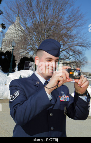 Washington DC D.C.,United States US Capitol,visitor center,tour,winter,snow,dome,government,Congress,Air Force,adult adults man men male,off Stock Photo
