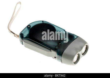 Small non battery ratchet clockwork levered LED torch Stock Photo