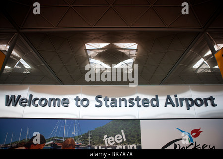 Welcome to Stansted Airport sign inside the terminal of London Stansted airport in Essex Stock Photo