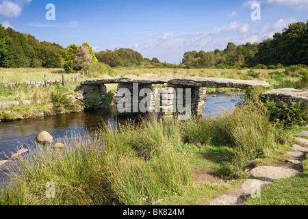 The ancient Clapper Bridge at Postbridge Dartmoor Devon UK Stock Photo