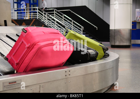 Baggage/Luggage on a luggage carousel at an airport Stock Photo