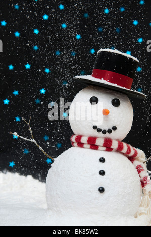 Snowman in the snow against starry night sky concept Stock Photo - Alamy