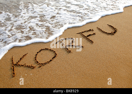 Korfu written in the sand on a beach, Corfu, Greece, Europe Stock Photo