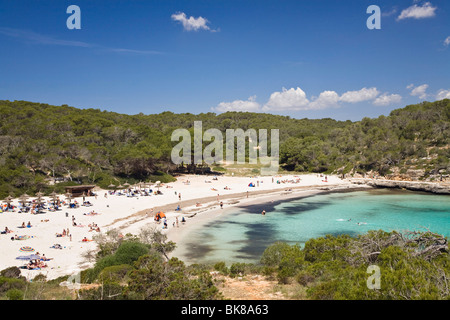 Beach life in the bay of s'Amarador, Cala Mondragó, natural park of Mondragó, Mallorca, Majorca, Balearic Islands, Mediterranea Stock Photo