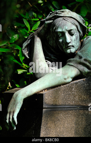 Historic statue of a grieving woman at the Ohlsdorf cemetery in Hamburg, Germany, Europe Stock Photo