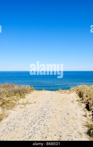 End of the road on beach cliff over ocean, Cape Cod National Seashore, Nauset Light Beach, Eastham USA Stock Photo