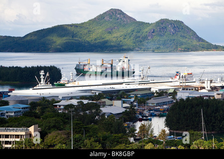 View from Bel Air towards the harbour of the capital city of Victoria, St. Anne Island at back, Mahe Island, Seychelles, Indian Stock Photo