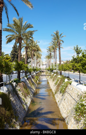 Main water canal running through the town of Kusadasi in Turkey on the Aegean coast Stock Photo