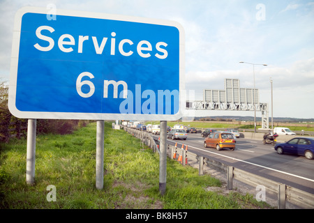 motorway services sign by the side of the M25 three miles south of the Dartford Crossing, Kent, UK Stock Photo