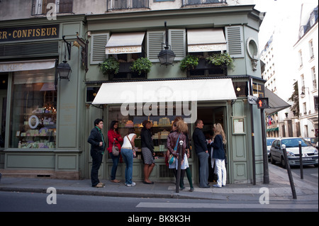 PARIS, FRANCE - JUNE 12, 2015: People In Front Of LADUREE Shop At