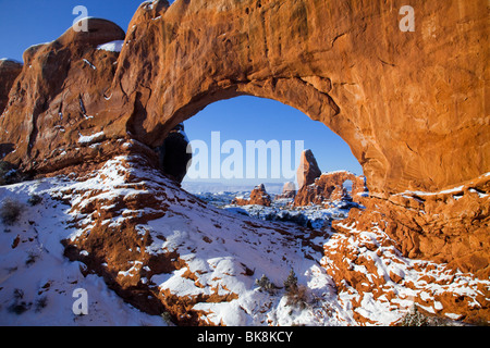 Turret Arch is viewed through the North Window in Arches National Park, Utah. Stock Photo