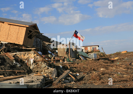 Man looking a house destroyed by earthquake and tsunami in South of Chile 2010 Stock Photo