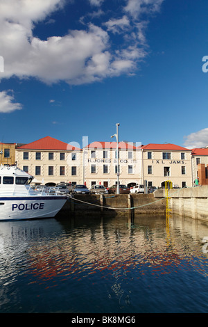 Police Launch, and Historic Henry Jones Jam Factory, Hunter Street, Victoria Dock, Hobart, Tasmania, Australia Stock Photo