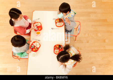 Children Eating School Lunch Stock Photo