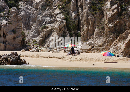Colored umbrellas on a sandy beach at Cabo San Lucas,Baja California,Mexico, Stock Photo