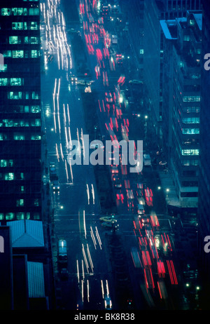 Night time view down on the lights and traffic in rain on Fifth Avenue, New York City, New York, USA Stock Photo