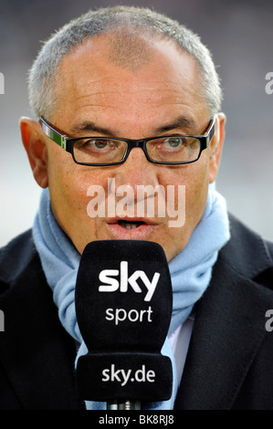 Felix Magath, Coach, Schalke 04, holding a microphone with a Sky Sports logo Stock Photo