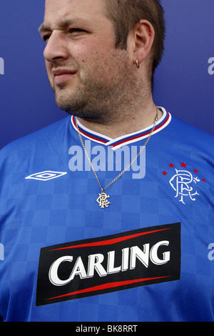 Glasgow Rangers Football Fan with Club Logo Necklace, Glasgow, Scotland Stock Photo