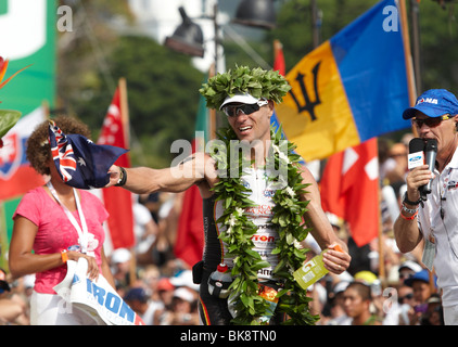 The Australian Craig Alexander crossing the finish line of the Ironman Triathlon World Championship as the winner in 8:20:21 ho Stock Photo