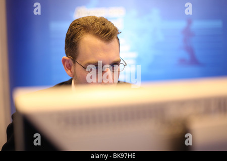 A man working on a computer Stock Photo