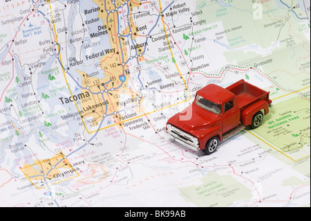 Die Cast Model Car Truck on Local Area Road Map Stock Photo