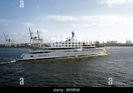 The world's largest privately owned yacht, the Eclipse, passes Tollerort Terminal in the port of Hamburg. Stock Photo