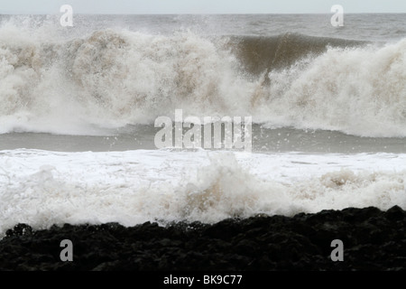 Atlantic breakers on the beach at Porthcawl running alongside the Esplanade Stock Photo