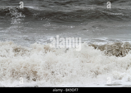 Atlantic breakers on the beach at Porthcawl running alongside the Esplanade Stock Photo