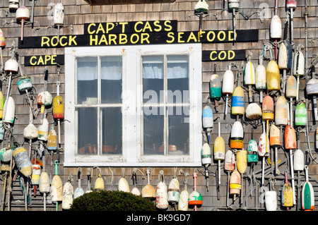 Lobster buoys on side of Cap't Cass Rock Harbor Seafood, Orleans, Cape Cod Stock Photo