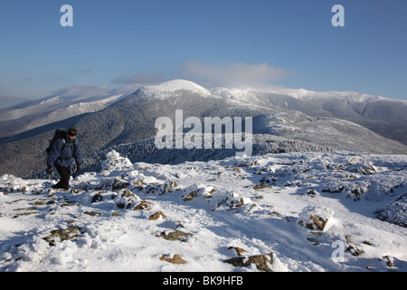 A hiker on the summit of Mount Pierce in the White Mountains, New Hampshire USA. Stock Photo