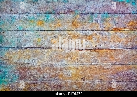 The wall - rotting boards with colored stains Stock Photo