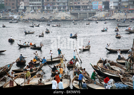 Boats on Buriganaga river in Sadarghat area of Dhaka, Bangladesh. Stock Photo