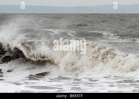 Atlantic breakers on the beach at Porthcawl running alongside the Esplanade Stock Photo