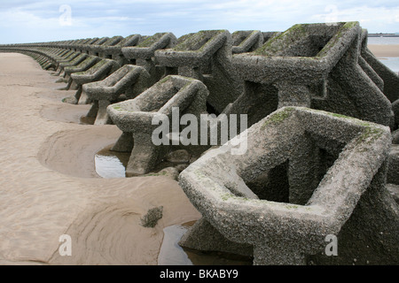 Concrete Geometric Shaped Sea Defence Groyne At New Brighton, Wallasey, The Wirral, UK Stock Photo