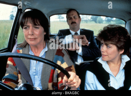 PENELOPE WILTON, JOHN CLEESE, SHARON MAIDEN, CLOCKWISE, 1986 Stock ...
