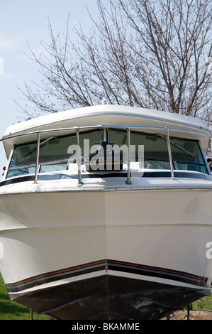 Motorboat on a stand being readied for boating Stock Photo